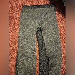 two pairs of capri leggings. same size